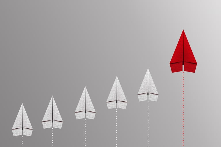 AXIOM website homepage displaying strategic insights for business decisions, featuring navigation menu and article cards on commercial strategy and sustainable growth