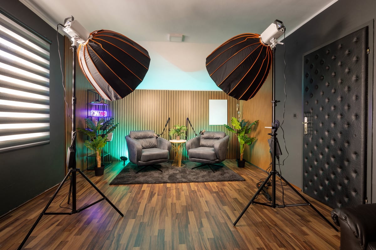 Podcast recording studio with advanced lighting system and modern design